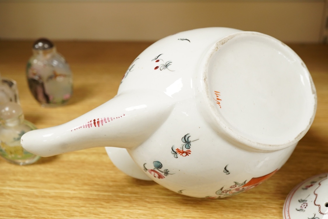 A Newhall porcelain boat shaped teapot, c.1800, together with a cream jug, tallest 14cm